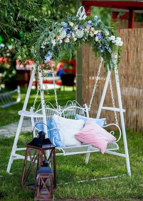 romantic hanging bench decorating flowers