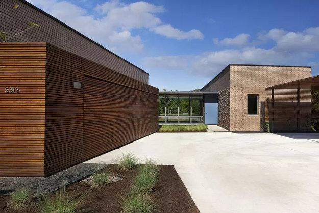 contemporary garage wooden cladding