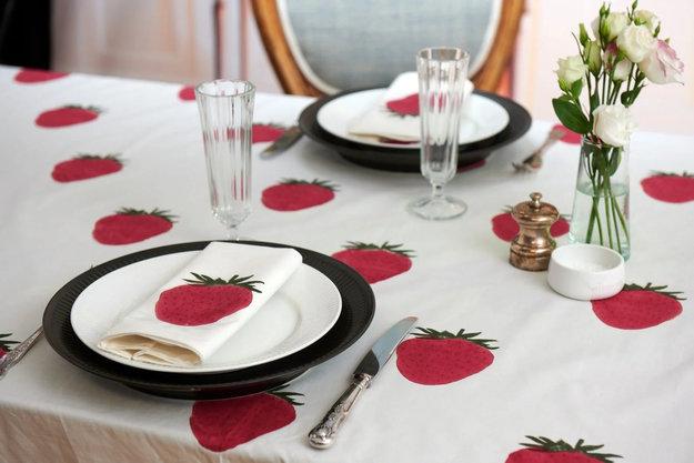 red white table setting strawberry accents