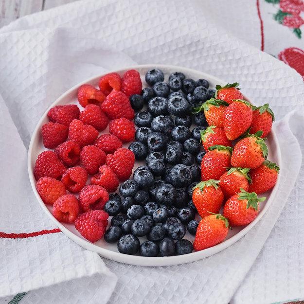 red white table setting strawberry accents