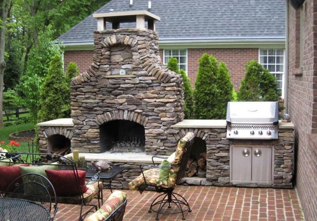 stone fireplace bbq area 