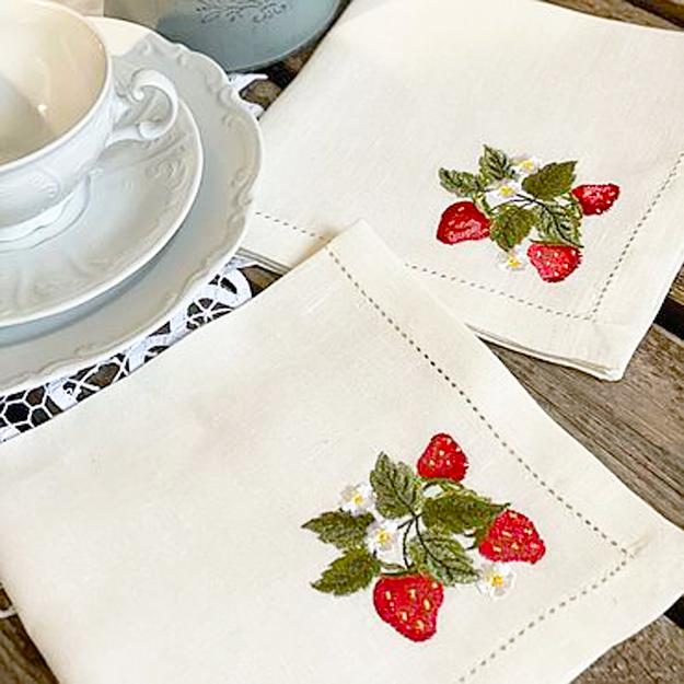 white tableware embroidered napkins