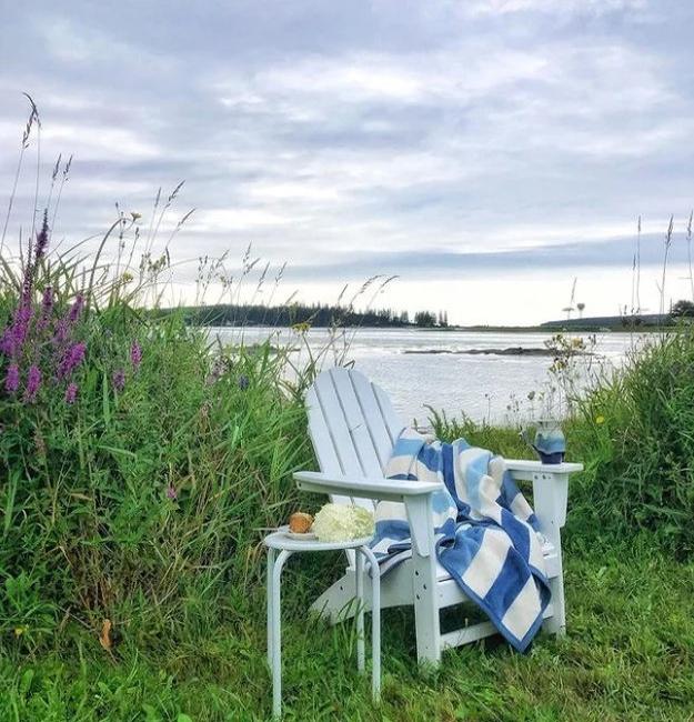 wooden chair blanket beautiful view