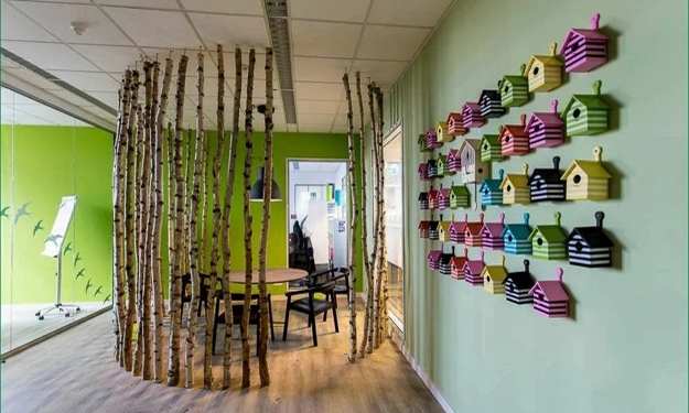 colorful birdhouses wall decorating idea