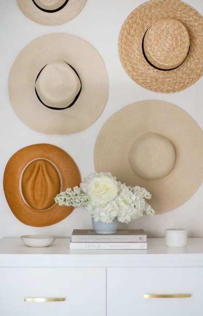 wall decorating with summer hats