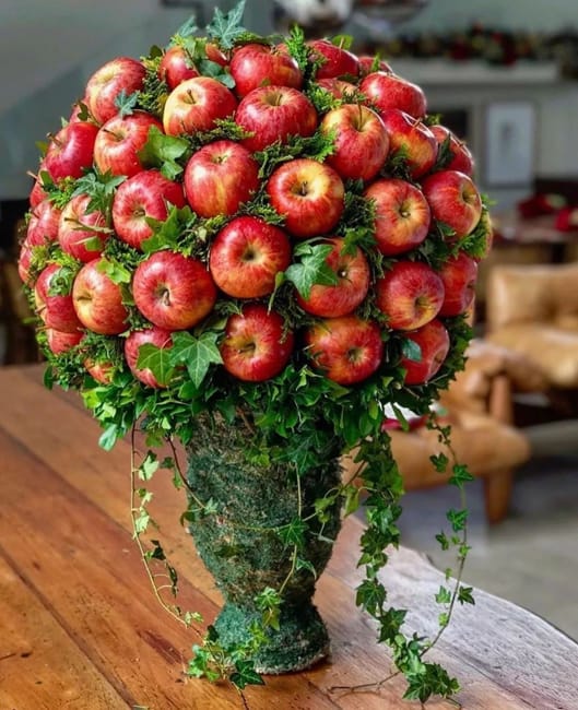 red apple english ivy floral arrangement