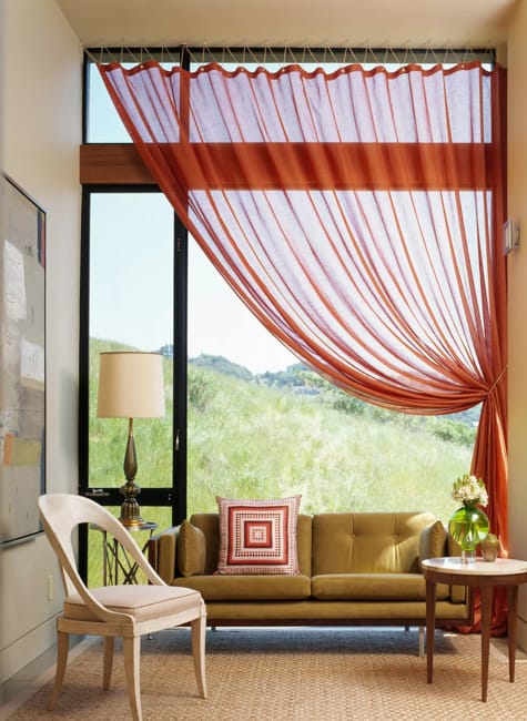 orange window curtain pillows