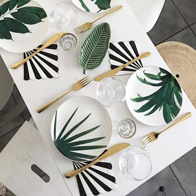 table setting green leaf plates