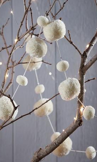white pompoms winter branches