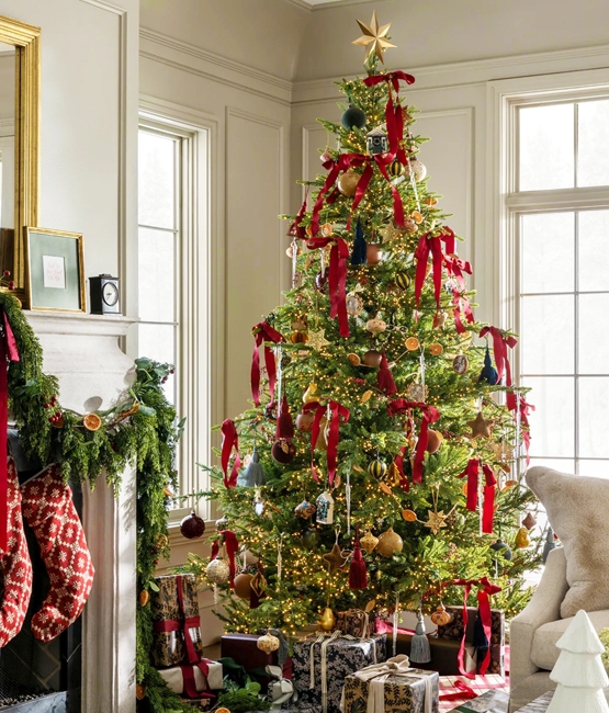 red ribbons holiday tree decorating