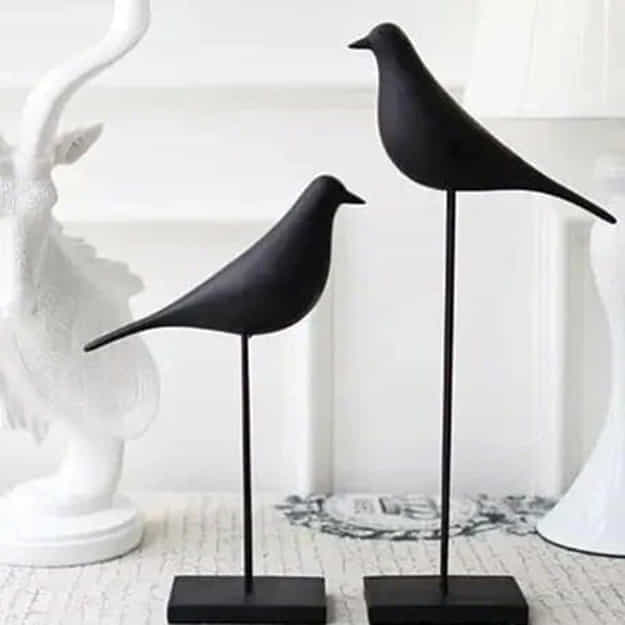 minimalist style black bird figurines