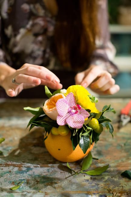floral arrangement orange vase